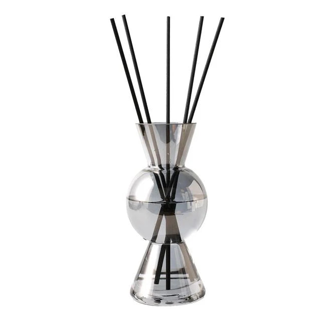 Black curved dome reed diffuser in colored bottle