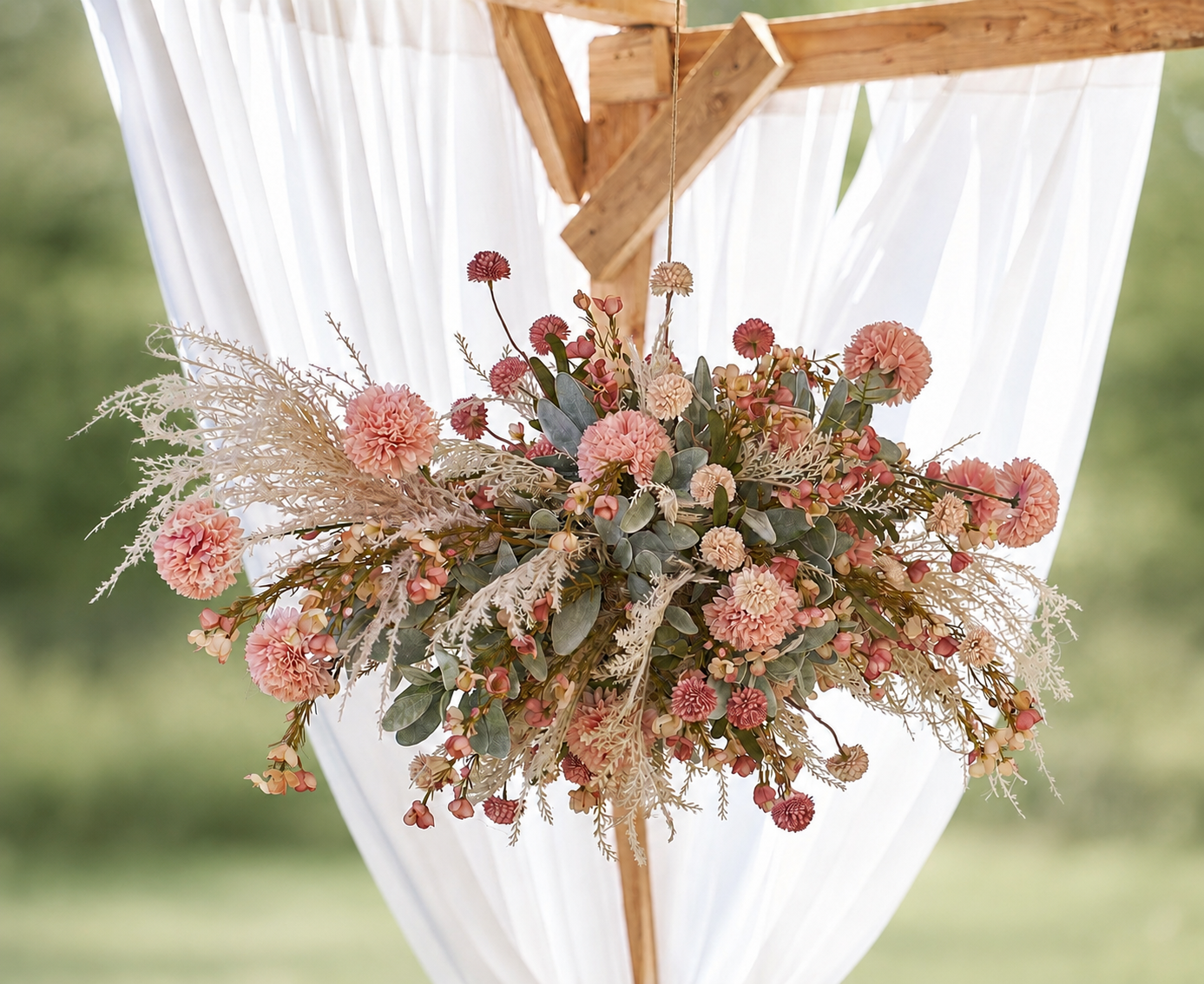 Meadow Bloom floral chandelier in a soft green garden